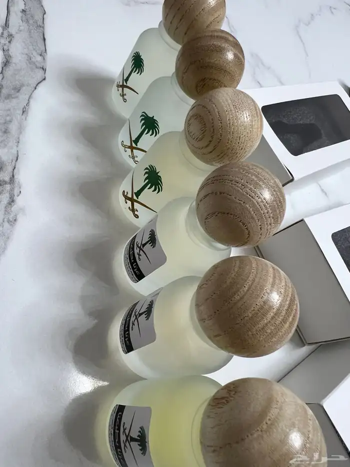 توزيعات عطور مع كرت ثيم طباعه خمريات هدايا 12