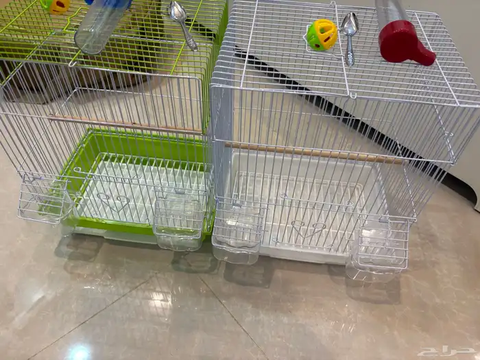 اقفاص و حقت مويه و ملاعق اكل و كور لعب ل الطيور 0