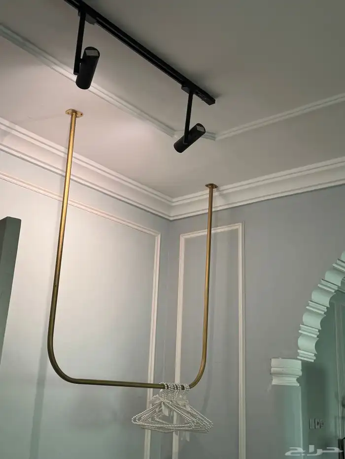 علاقة عبايات حديد 0