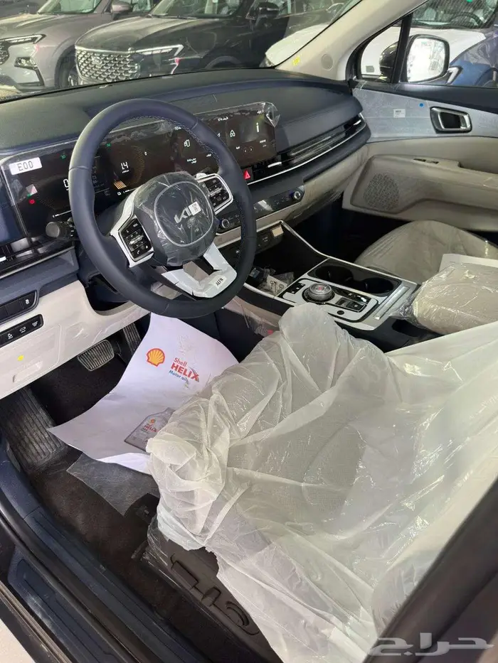كيا كرنفال نص فل هايبرد 2025 11