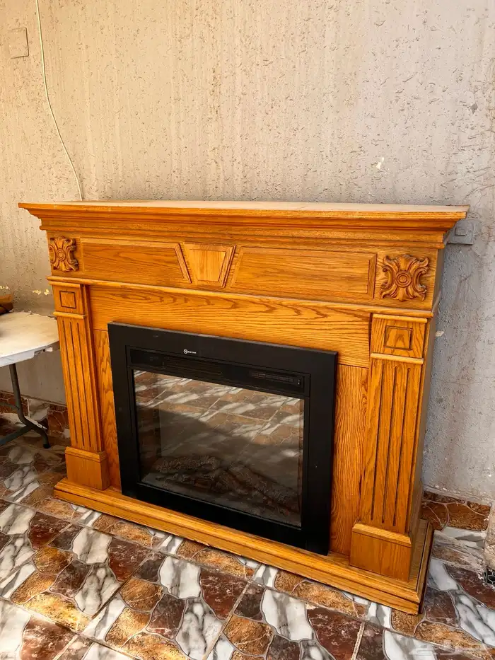 للبيع دفاية كهربائية مع ديكور خشبي فاخر 1