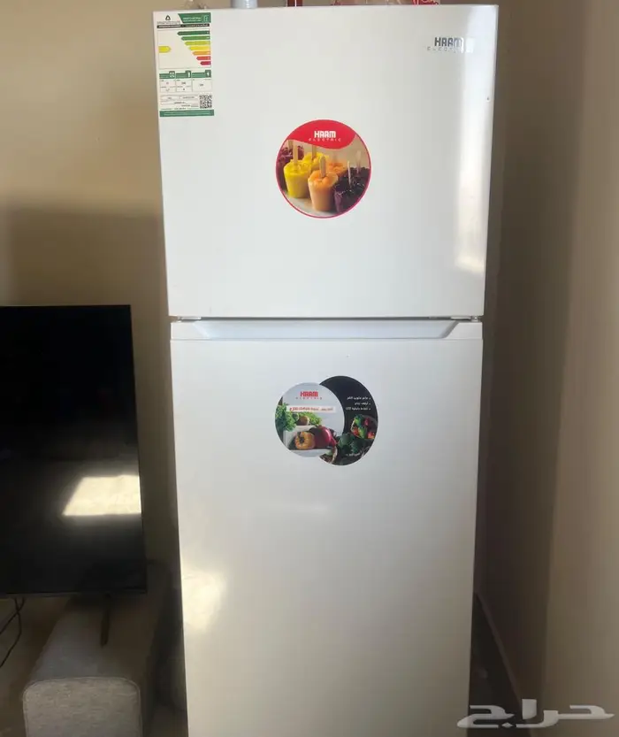 شاشة MTC 65 UHDبوصة و ثلاجة 1