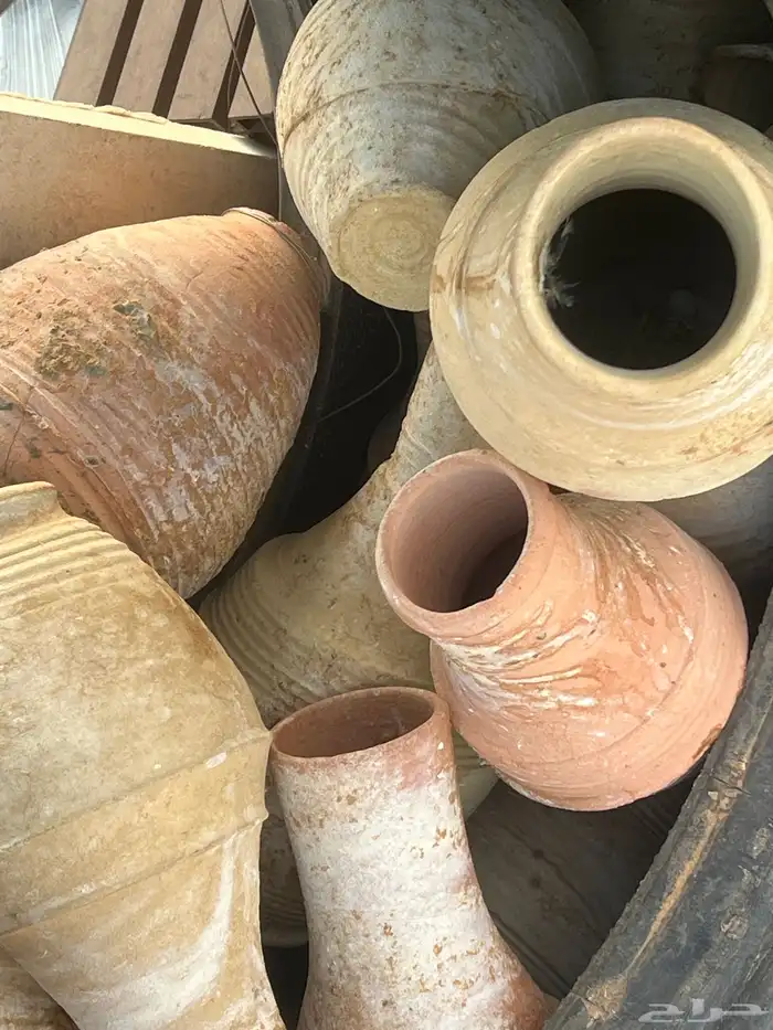 جرت فخار الطيور البادجي العداد حول 25جره الموقع ميقوع 0