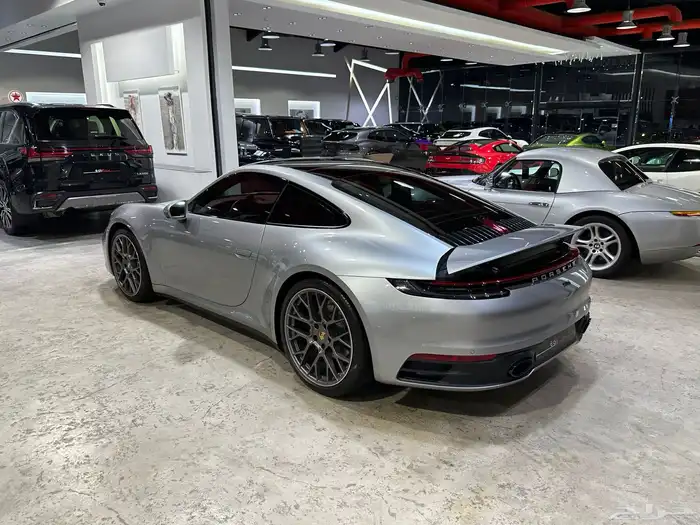 بورش 911 كاريرا موديل 2024 ماشي 9.202 كم وارد الوكالة 3