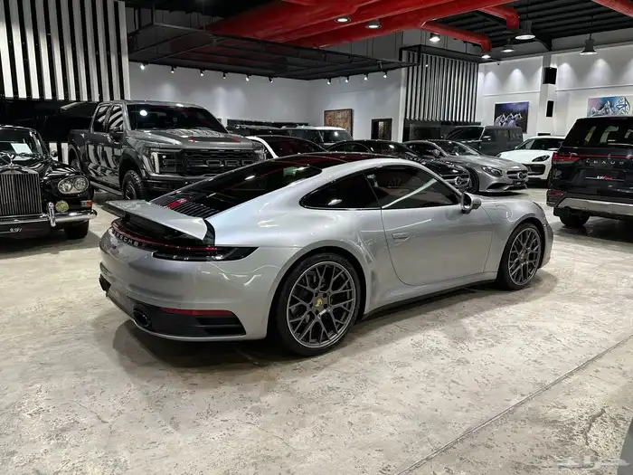بورش 911 كاريرا موديل 2024 ماشي 9.202 كم وارد الوكالة 2