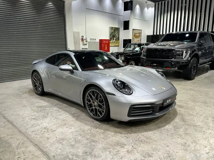 بورش 911 كاريرا موديل 2024 ماشي 9.202 كم وارد الوكالة 1