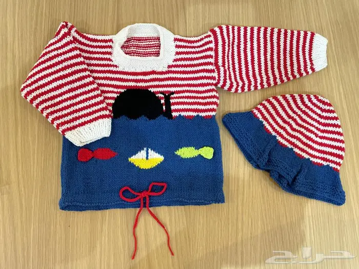 ملابس للرضع من الكروشيه 0