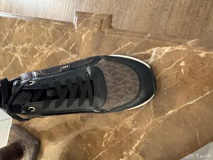 جزمة مايكل كورس اخت الجديدة 0