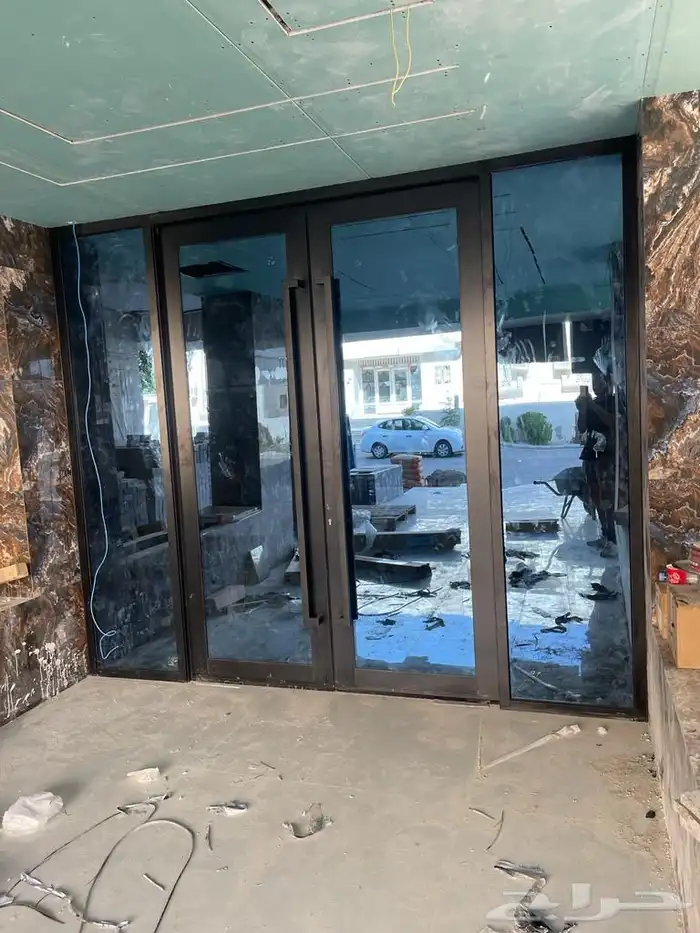 نوافذ و أبواب UPVC وألمنيوم وأبواب WPC و شترات 11