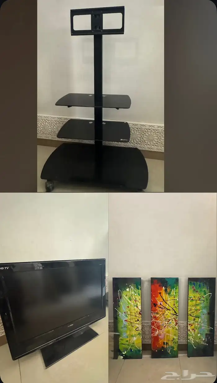 تلفزيون وطاولة ولوحة 0