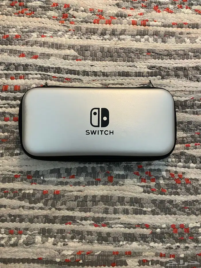 نينتندو سويتش اوليد مع كامل ملحقاته واشرطه 10