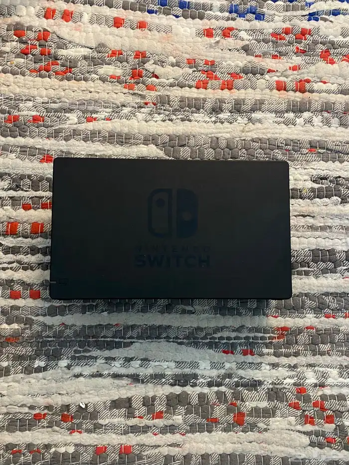 نينتندو سويتش اوليد مع كامل ملحقاته واشرطه 7