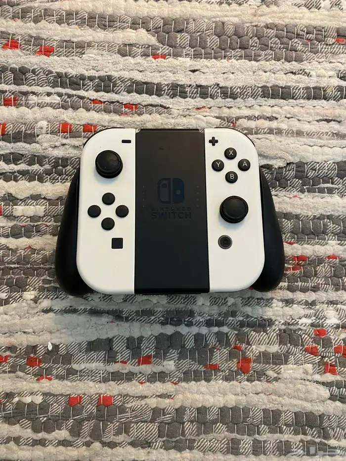 نينتندو سويتش اوليد مع كامل ملحقاته واشرطه 6