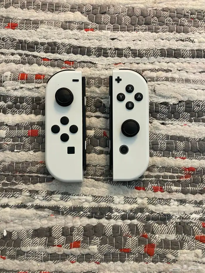 نينتندو سويتش اوليد مع كامل ملحقاته واشرطه 3