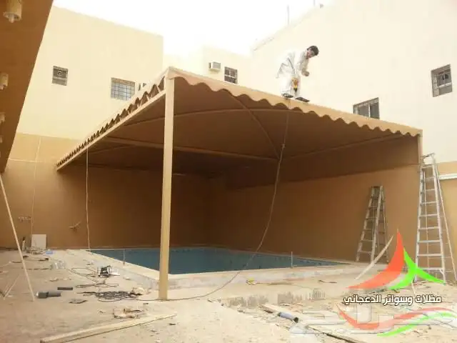 مظلات سيارات سواتر هناجر جميع انواعها تركيب 7