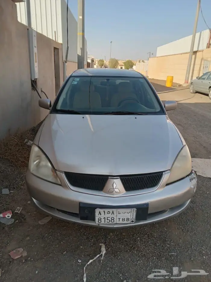 سياره متسوبيشي لانسر 2009 11