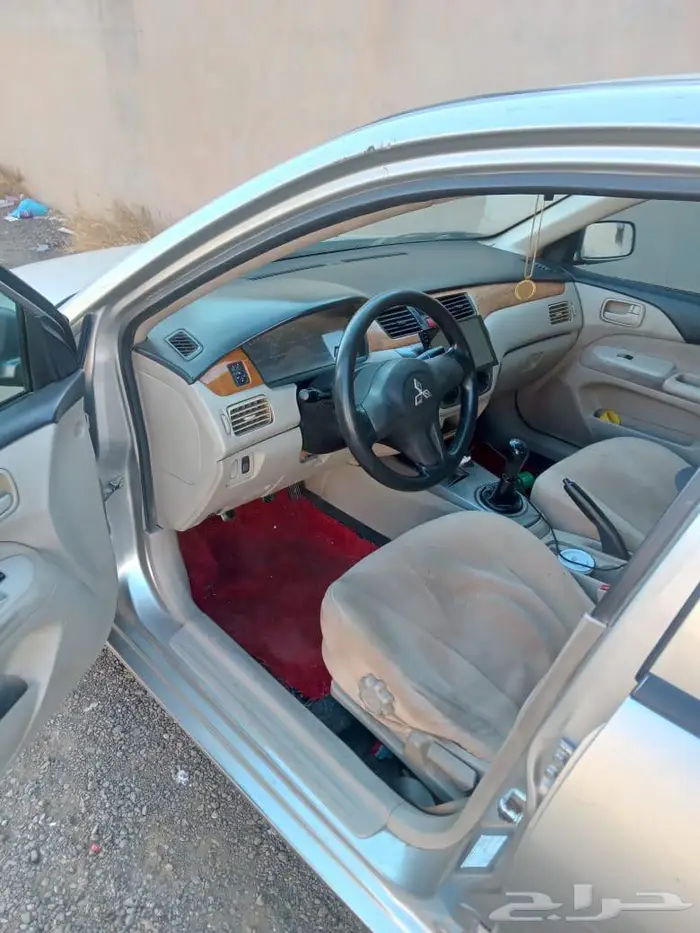 سياره متسوبيشي لانسر 2009 12