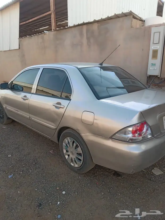 سياره متسوبيشي لانسر 2009 13