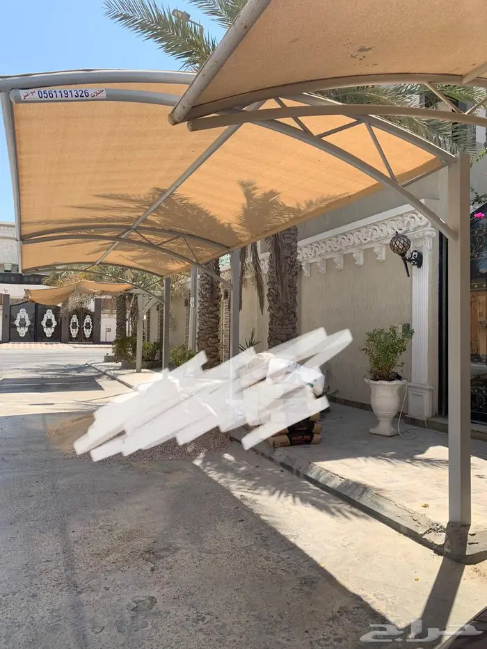 مظلة سيارات شبه جديده 1