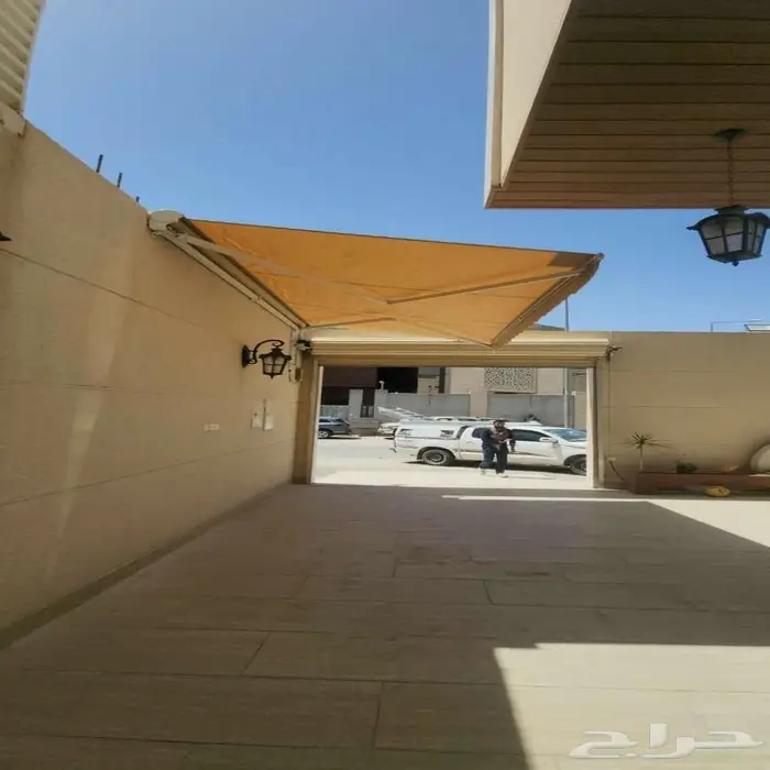 عروض بمناسبة العيد الوطني لتركيب مظلات سيارات متحركة 2