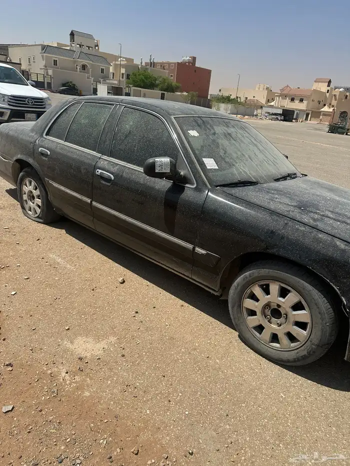 ماركيز 2003 للبيع اللون اسود 1