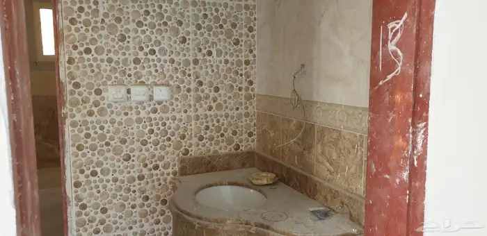 عمارة على شارعين للبيع في مخطط بريمان 4