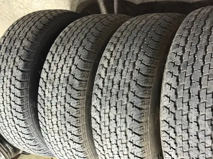 أربع كفرات دعسة برجستون شبه الجديد مقاس 16-70-275 4