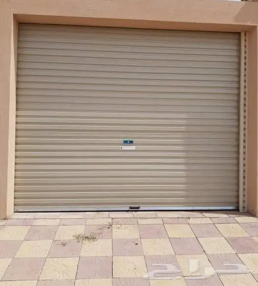 صيانه و تركيب ابواب الكراجات اتوماتيك 1