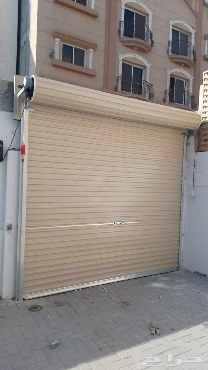 صيانه و تركيب ابواب الكراجات اتوماتيك 0