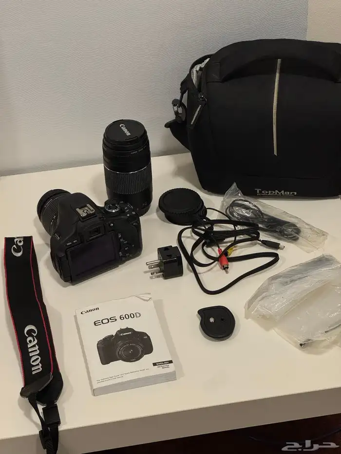 للبيع كاميرا كانون مع عدسات ب1000 ريال 0