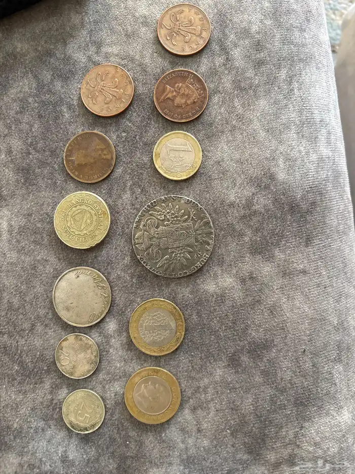عملات متنوعه قديمة توايخ 1987و1994و 1915و2000 1
