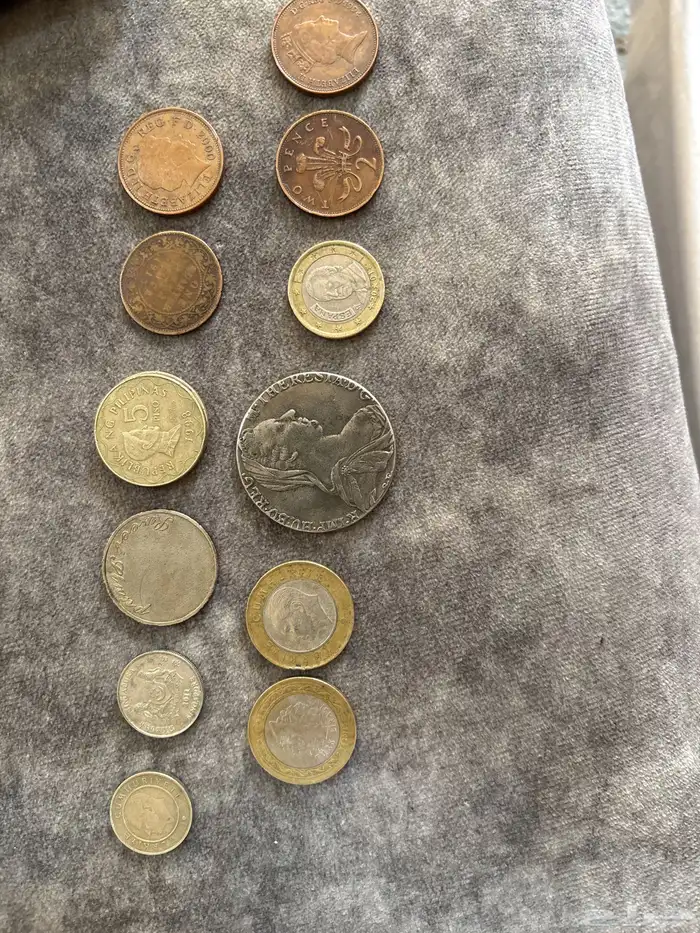 عملات متنوعه قديمة توايخ 1987و1994و 1915و2000 0