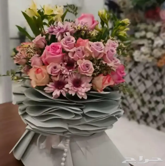 باقات ورد طبيعي وصناعي فازات وعقود تخرج 13