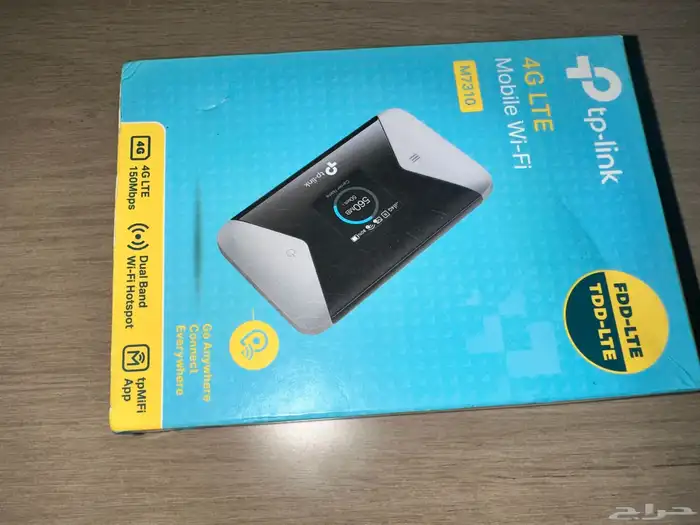 راوتر محمول Tplink و كيبورد Logitech 1