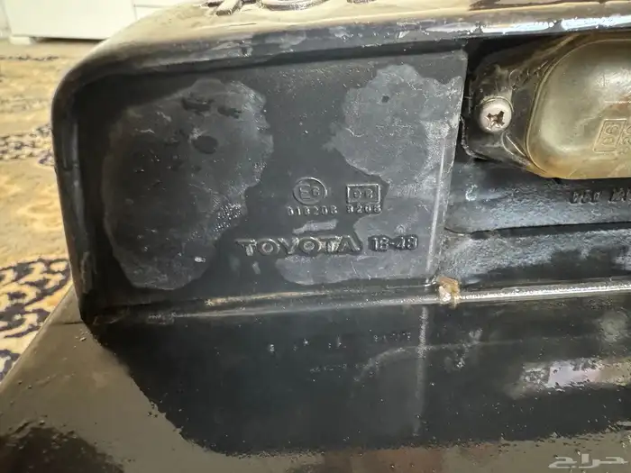 قاعدة لوحه جيب صالون من 97 وتحت شنطه بالوسط نظيفه اصليه 2