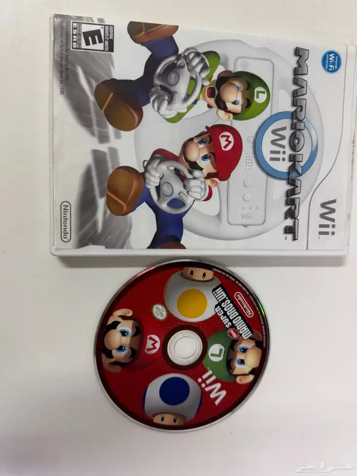 بيع جهاز Wii مستعمل بحالة جيده مع لعبتين 2