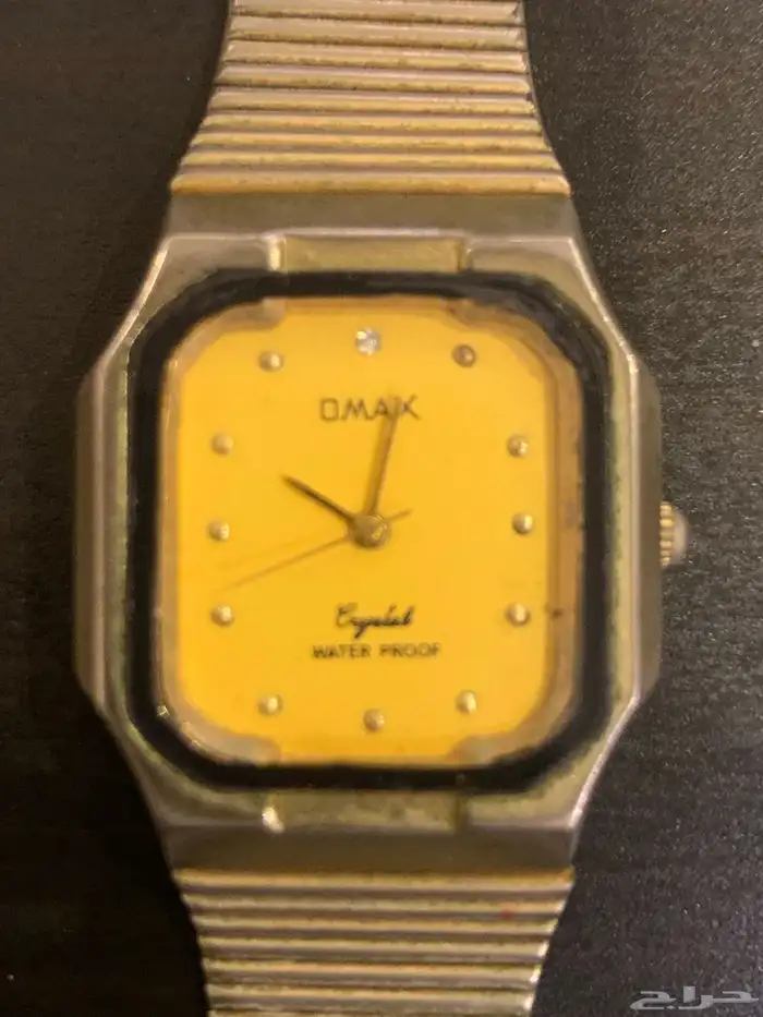 ساعة OMAX --متوقفة وتحتاج بطارية (لم يتم فتحها أو- تجربتها). 2