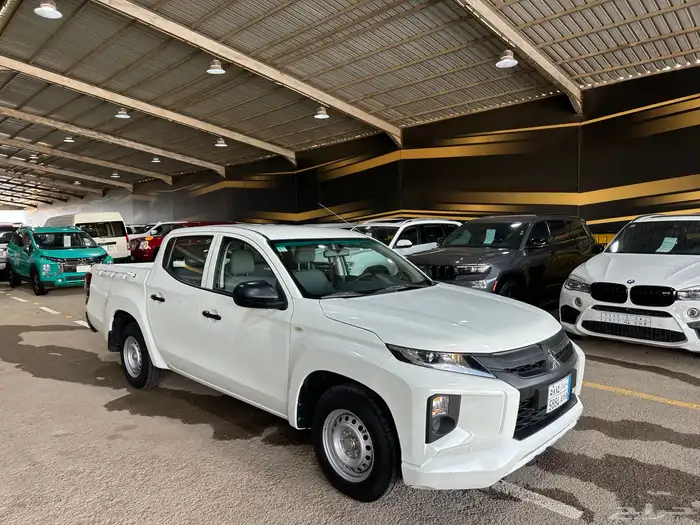 ميتسوبيشي 2023 مخزن شبه جديد عداد 15 الف(مباع) 7