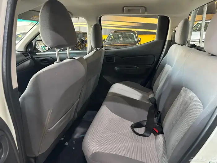 ميتسوبيشي 2023 مخزن شبه جديد عداد 15 الف(مباع) 12