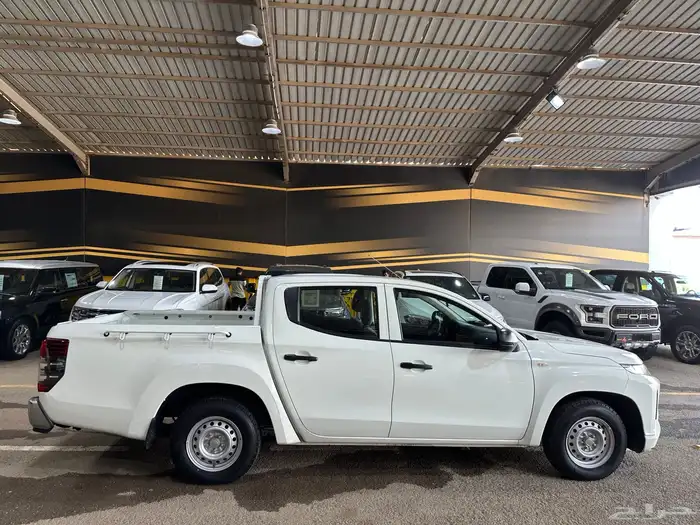 ميتسوبيشي 2023 مخزن شبه جديد عداد 15 الف(مباع) 6