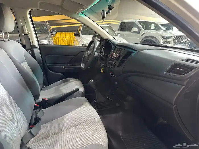 ميتسوبيشي 2023 مخزن شبه جديد عداد 15 الف(مباع) 13