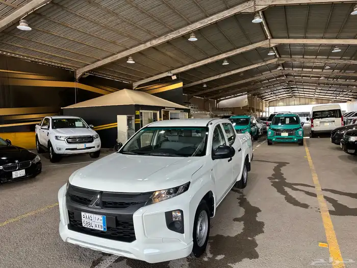 ميتسوبيشي 2023 مخزن شبه جديد عداد 15 الف(مباع) 8