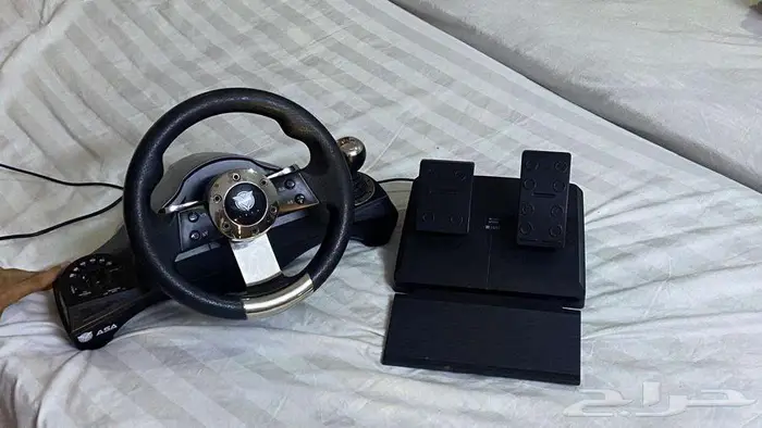 عجلة قيادة للألعاب مع دواسات - للبيع gaming steering 2