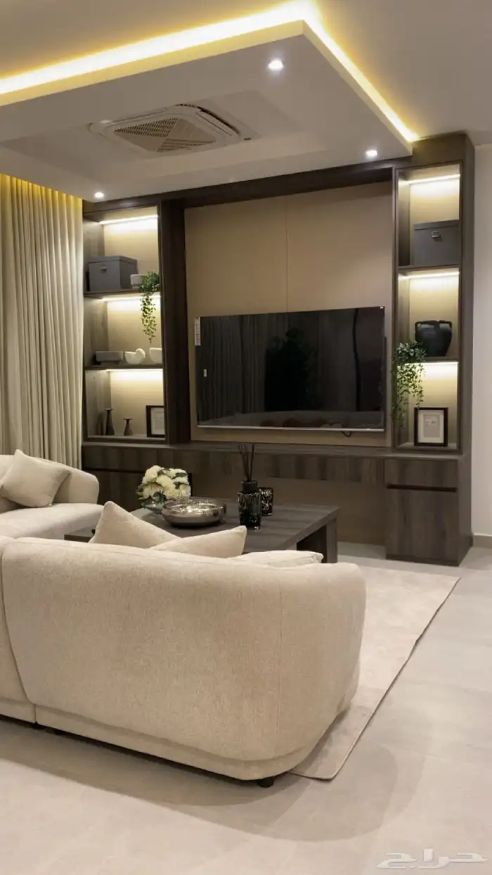 شقه سكنيه مفروشة جديده لل للأيجار السنوي خلف برج رافال 12