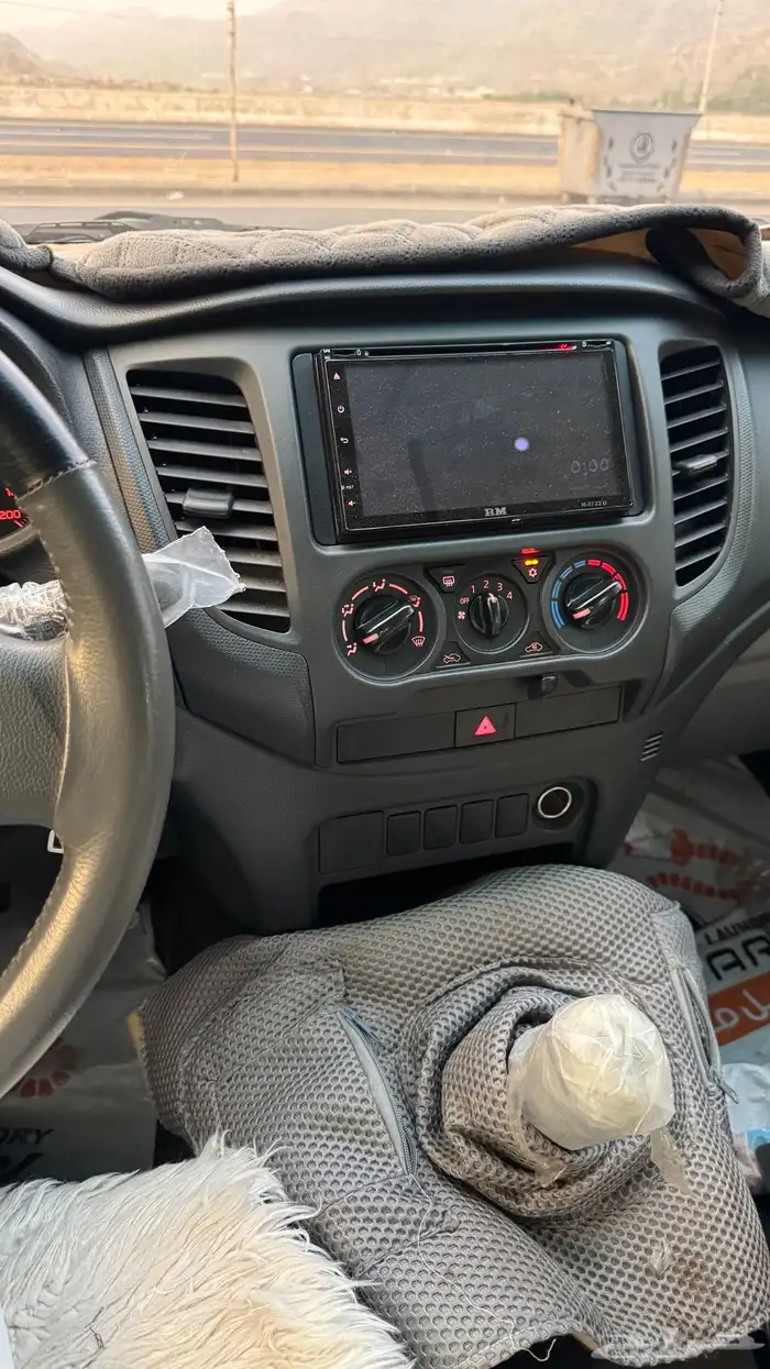 للبيع ميتسوبيشي 2016 مخزنه بنزين عداد 52 الف 6