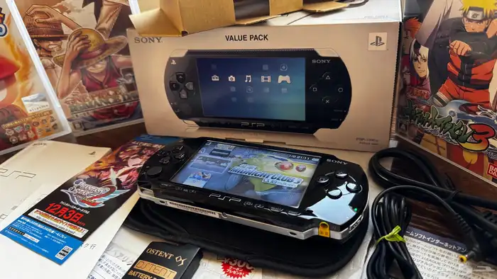 جهاز سوني PSP 1000 (نادر ) أصلي بكرتونه مع 20 شريط أصلي 0