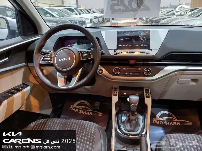 كيا كارينز نص فل gls 2025 13