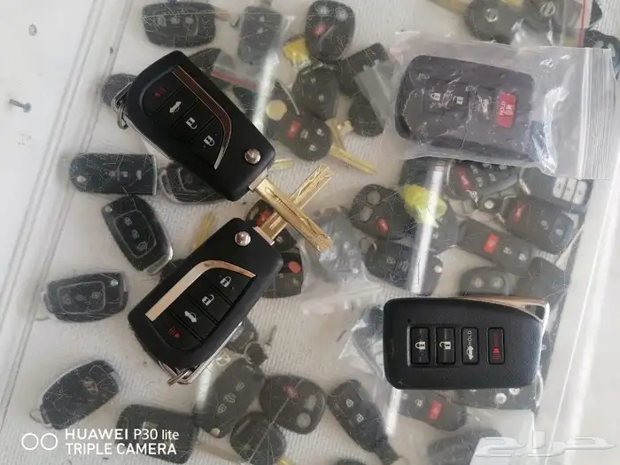 محل مفاتيح سيارات ريموتات فتح ابواب خشب 3