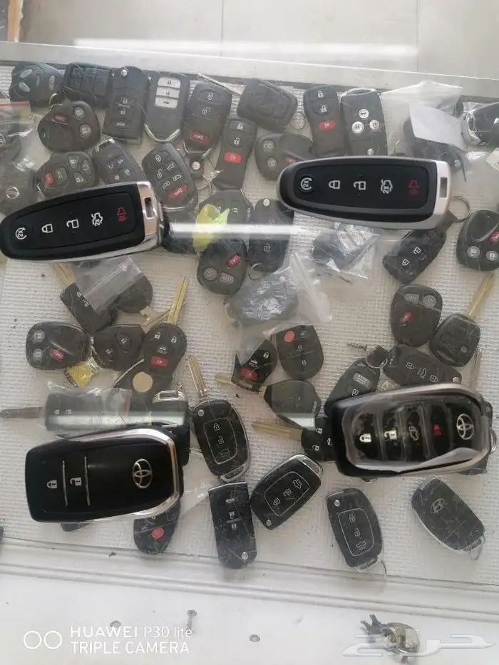 محل مفاتيح سيارات ريموتات فتح ابواب خشب 1