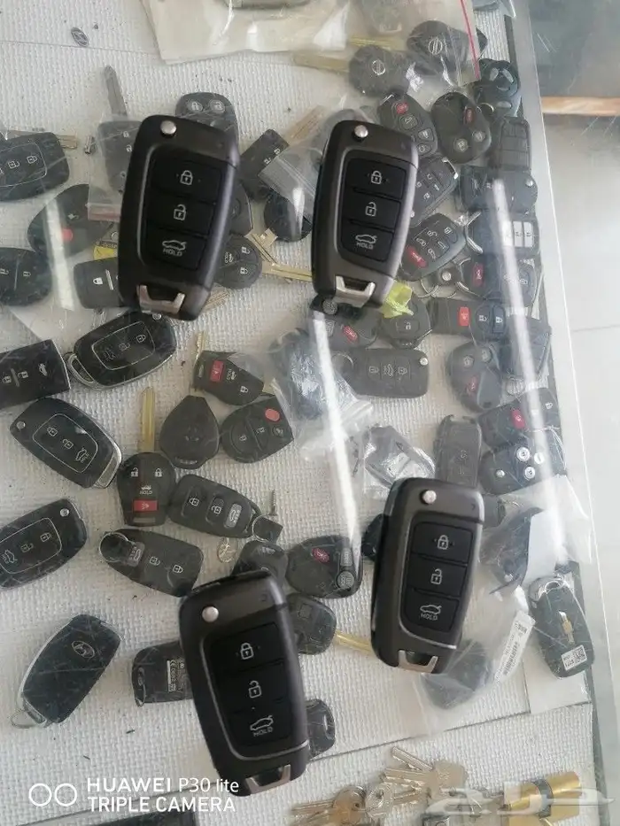 محل مفاتيح سيارات ريموتات فتح ابواب خشب 5